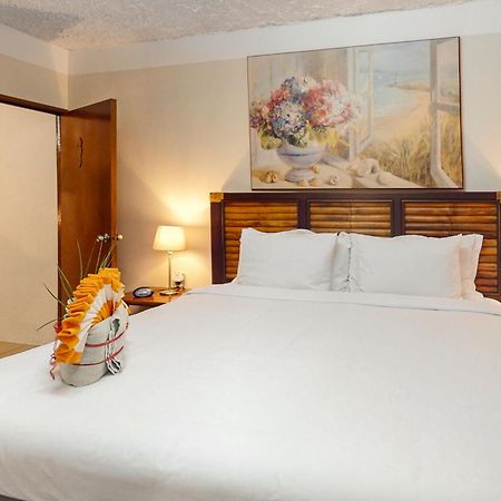 Hummingbird Home Suites San Pedro  Habitación foto